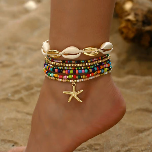 Juwelanda BOHO Fußkettchen Set – 7-teilig | Muschel & Seestern Charms | Bunte Perlen - Chakra