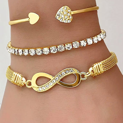 Juwelanda INFINITY HERZGLANZ – 3-teiliges goldenes Zirkonia-Armband-Set