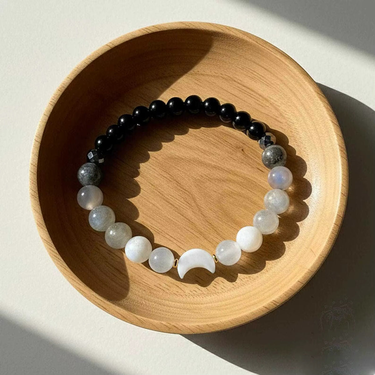 Perlen aus Mondstein, Labradorit, Achat und schwarzem Obsidian